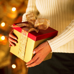 woman offering gift box